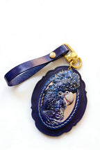Hand-carved leather custom oval pet portrait tag