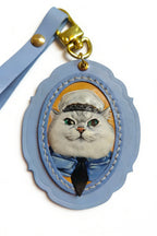 Hand-carved leather custom oval pet portrait tag